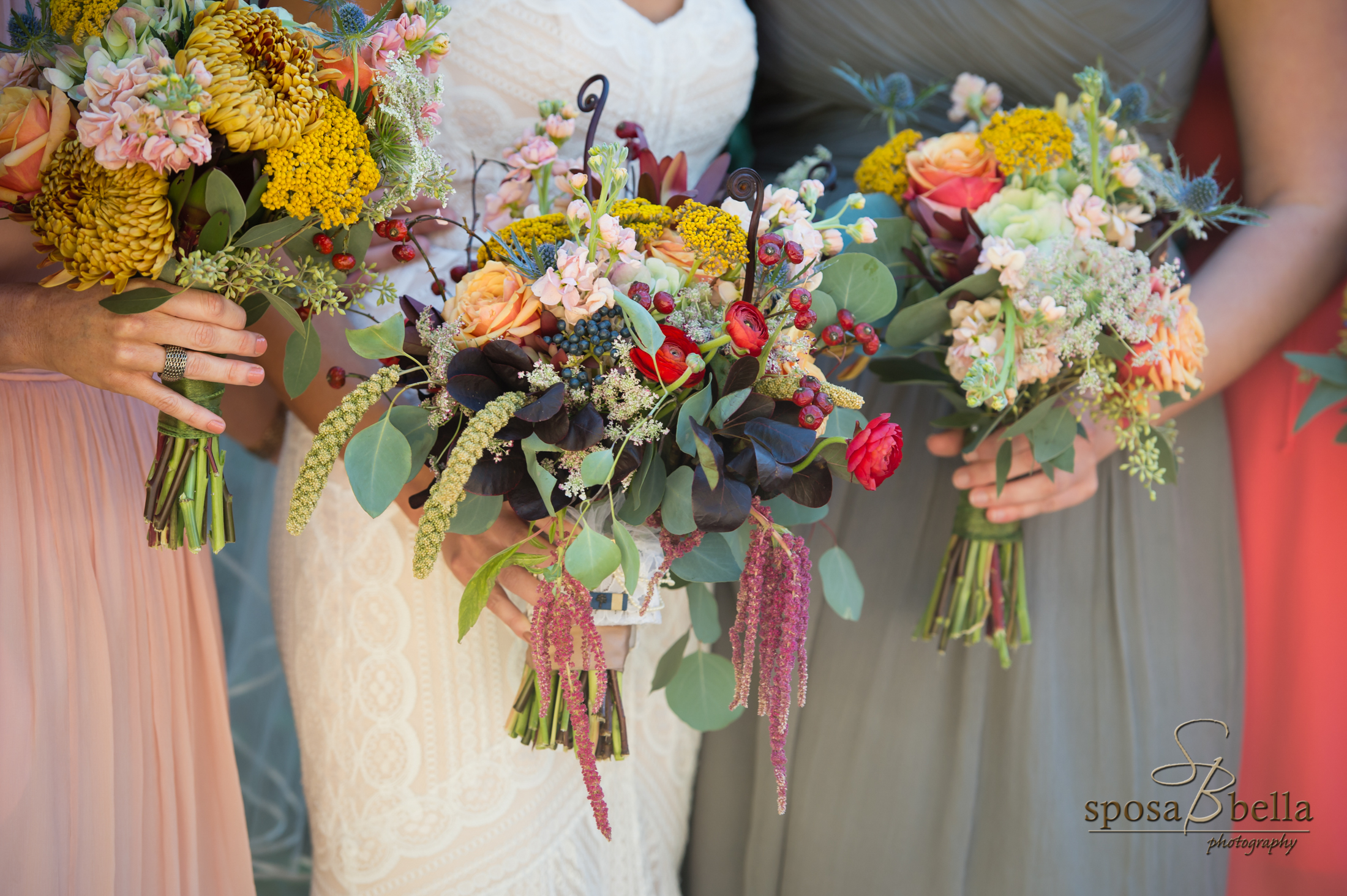  Can you say "wow"! Adina with Frilly Bloomers incorporated bright and muted tones to create these beautiful bouquets that set the tone for this Fall wedding. 