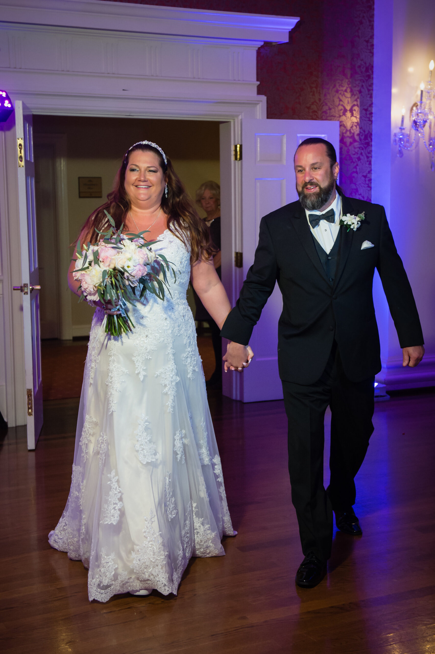  Kim &amp; Mark made their grand entrance into the color-filled room and began their long awaited first dance as husband &amp; wife. They chose the classic "You're My Home" by Billy Joel. 