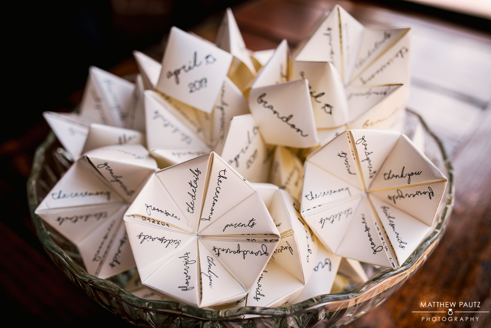  Do you remember the origami paper fortune tellers from way back when? Whitney and Brandon transformed this childhood game into beautiful wedding programs. 