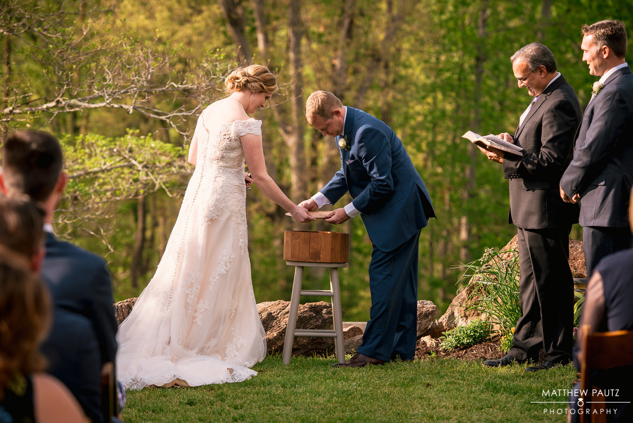  Whitney &amp; Brandon decided to seal a bourbon barrel during their ceremony. Each placed a letter inside the barrel. In a certain amount of time, they are to open the box, cheers to the memories made &amp; read the letters. 