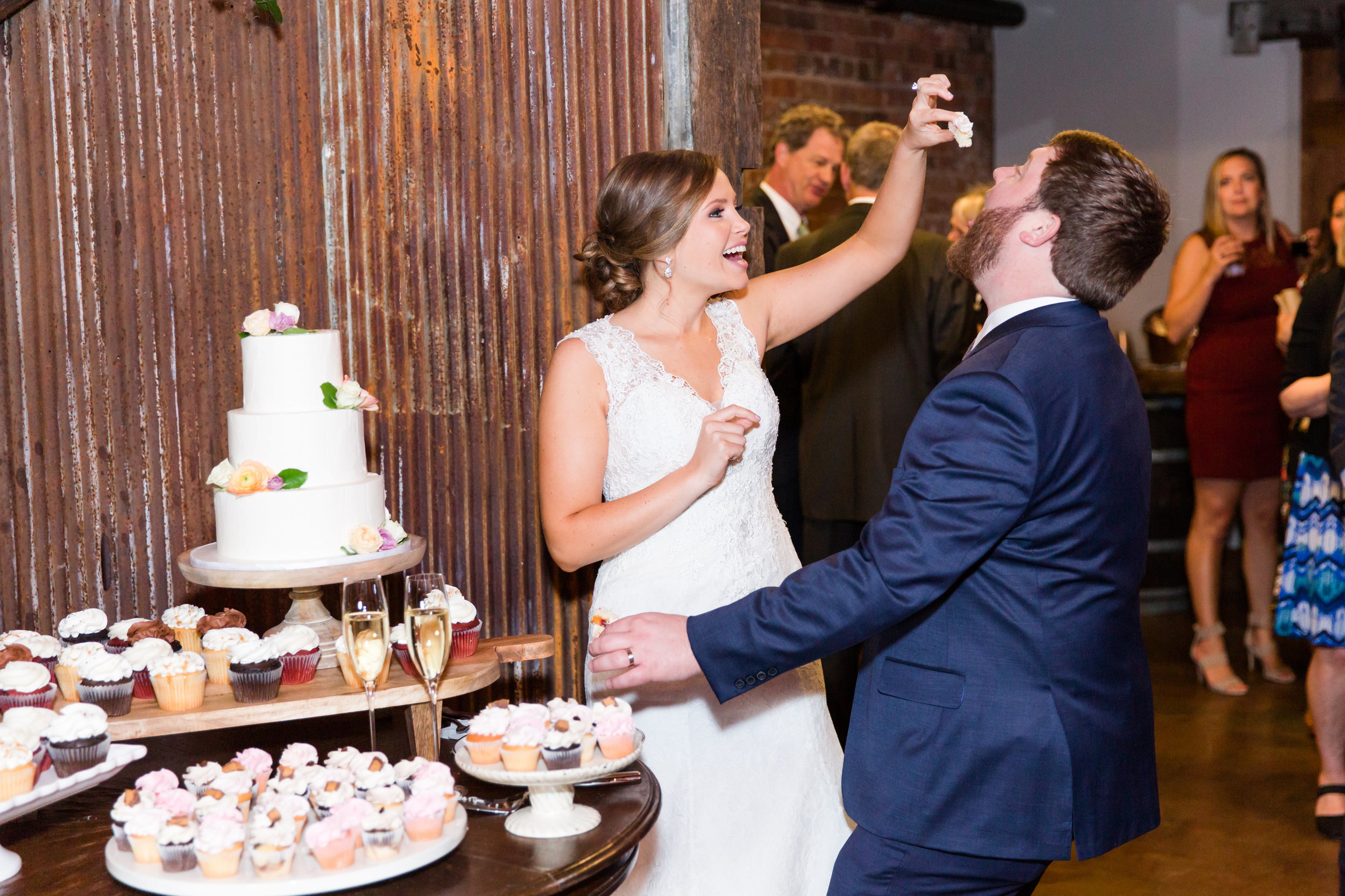  Megan and Ben enjoying some delicious cake from Couture Cakes. Susan is extremely talented at wedding cake design. She can really do anything with a cake! 