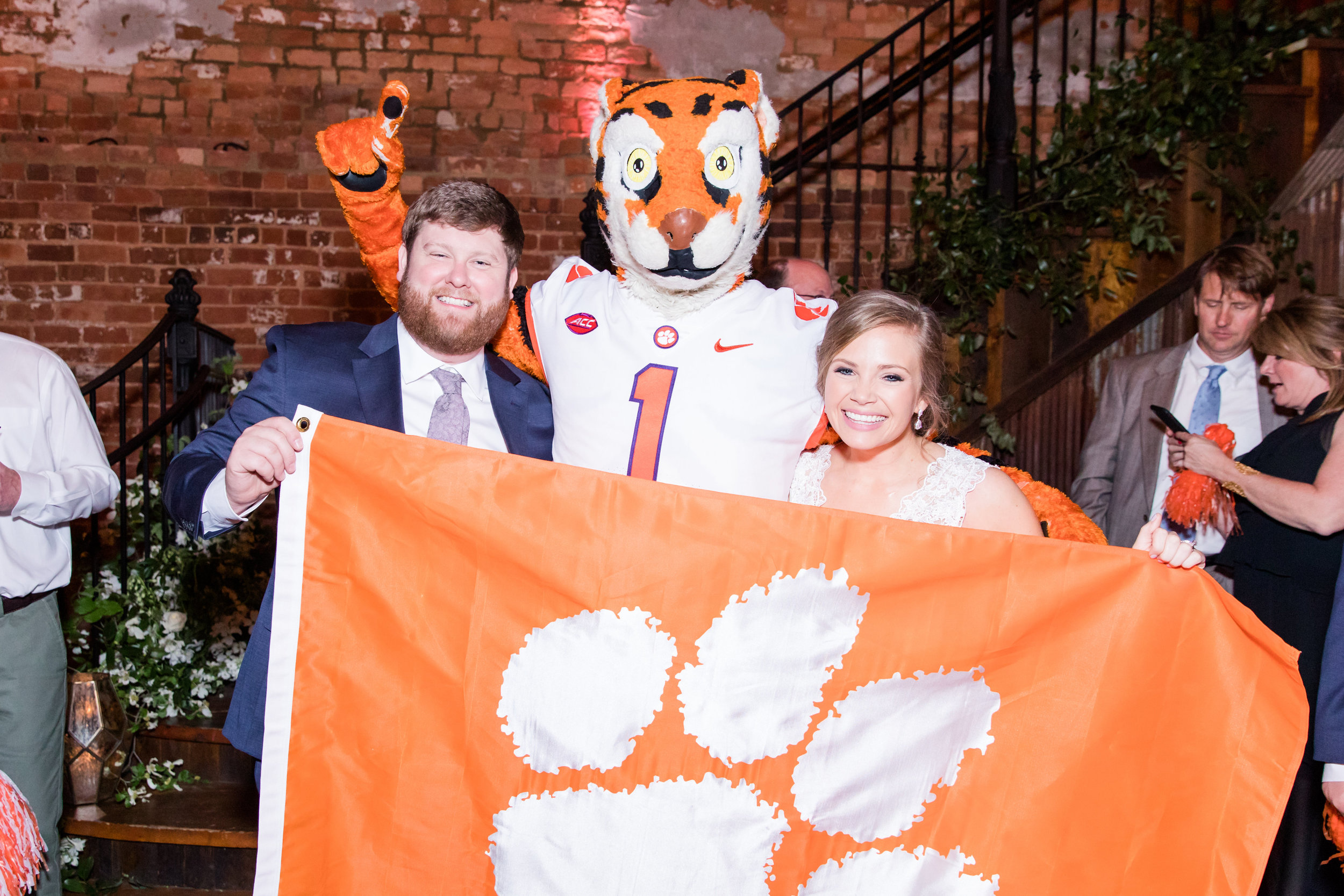 What Clemson wedding is complete without an appearance from the Clemson Tiger, himself. We love incorporating mascots into the wedding dance party. 